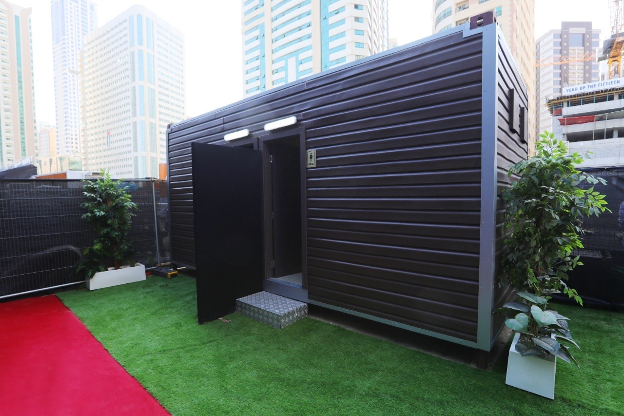 portable toilets - brown colour with side view-open door